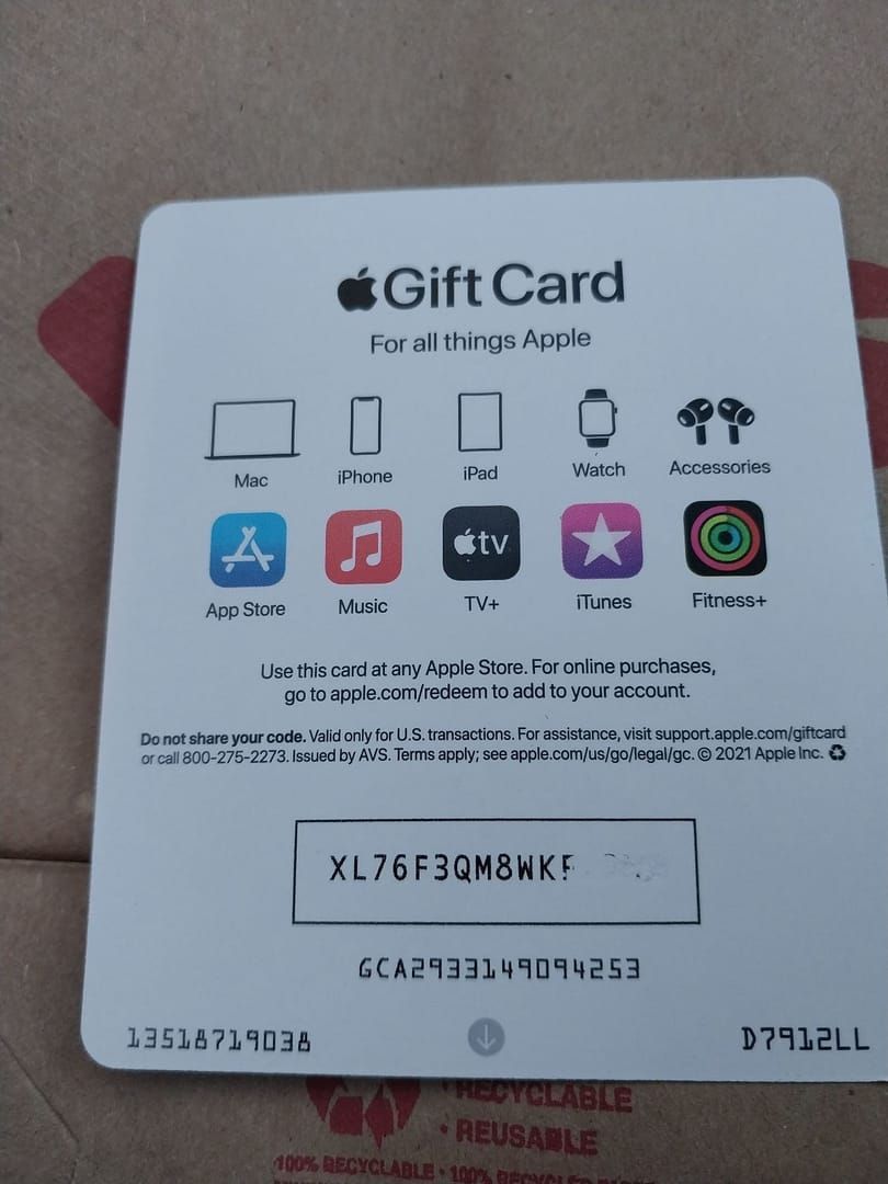 Back of an Apple Gift Card highlighting the 16 digit code starting with X
