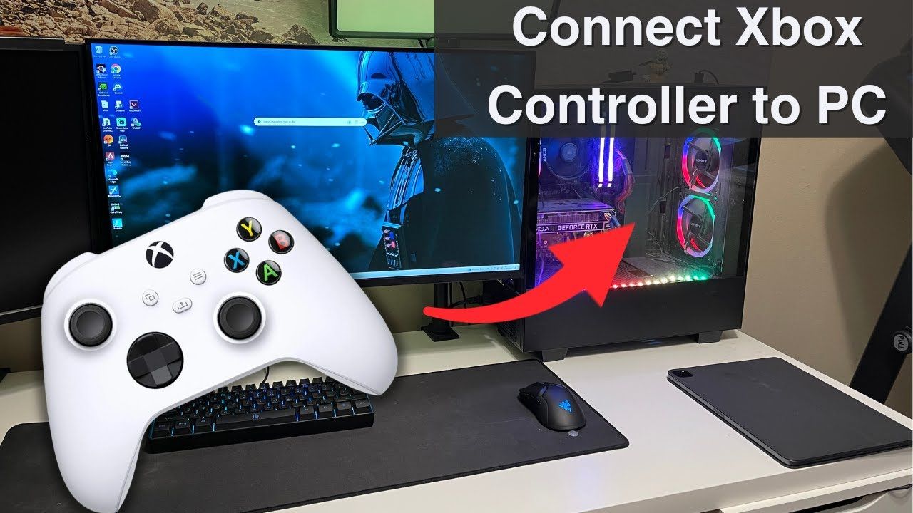 Gaming setup with Xbox controller and console on desk